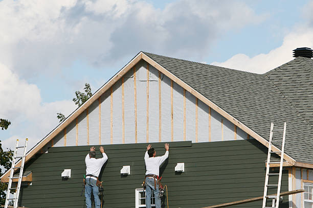Professional Storm Damage Siding Repair technician working in Unionville, TN
